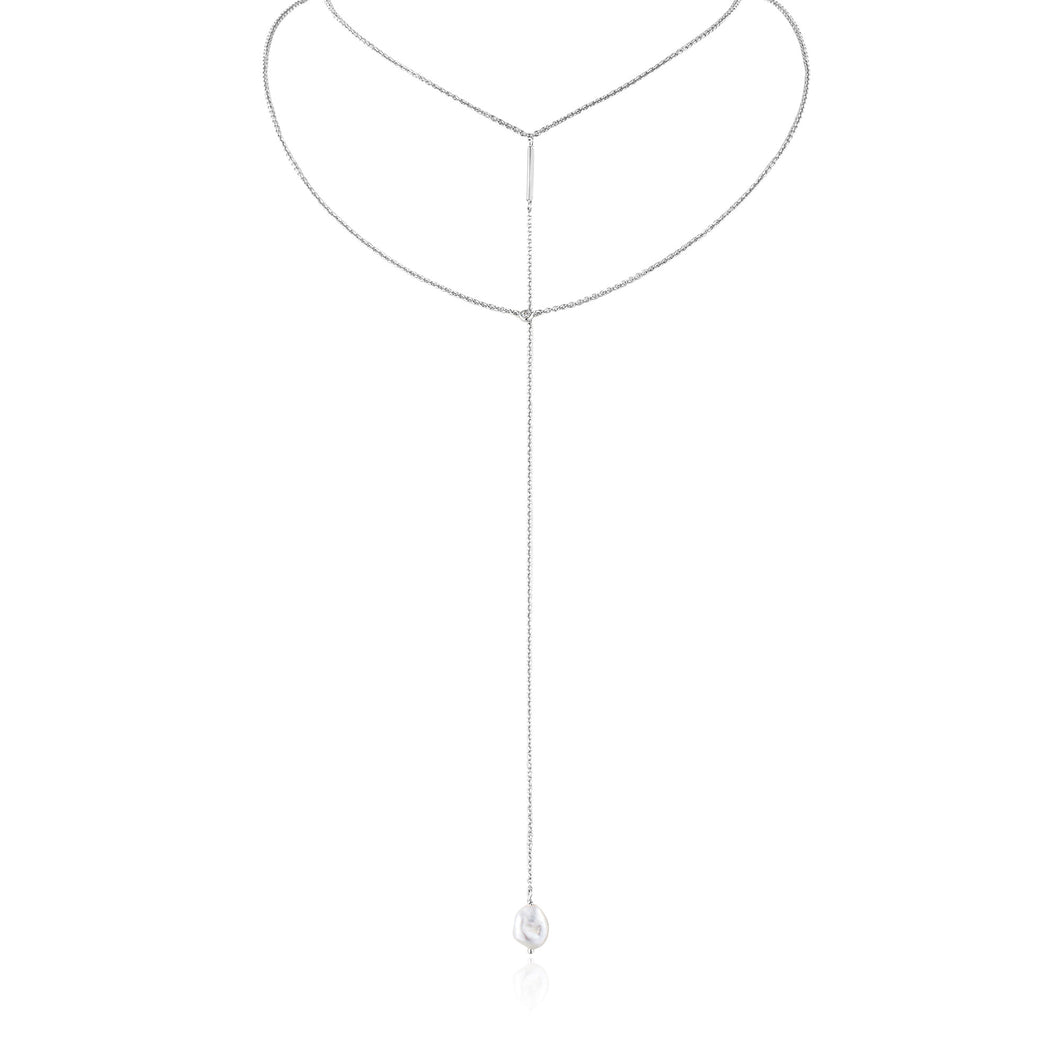 Silver Pearl Y Necklace  the necklace pairs a choker and chain with a single drop, finished with a baroque fresh water pearl